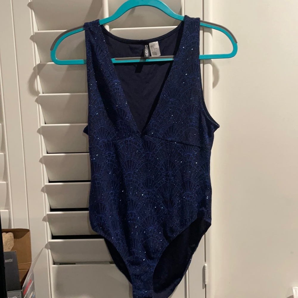 Sparkly deep V-neck bodysuit with art deco pattern